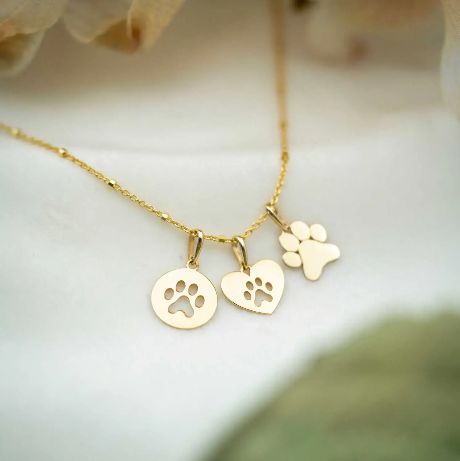 Anheng i gull Poten.