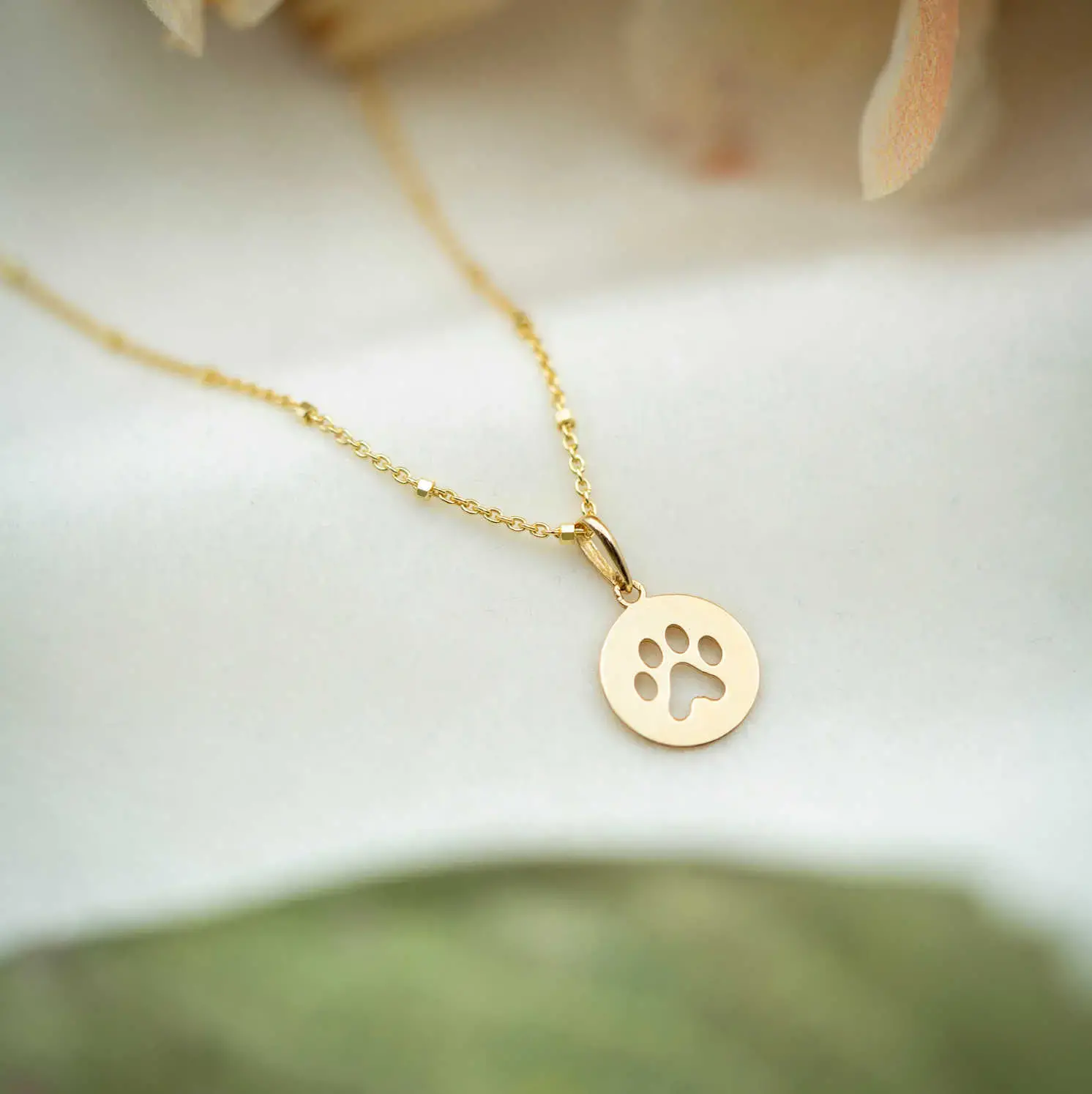 Anheng i gull Poten.