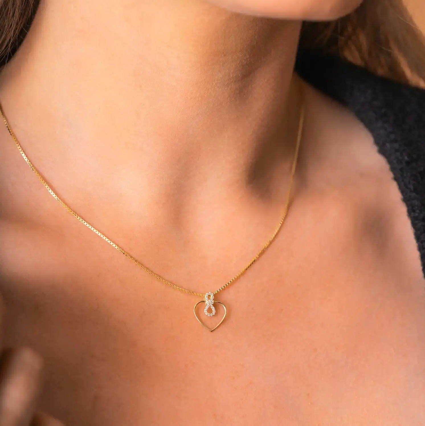 Anheng i gull Poten med zirkonia.