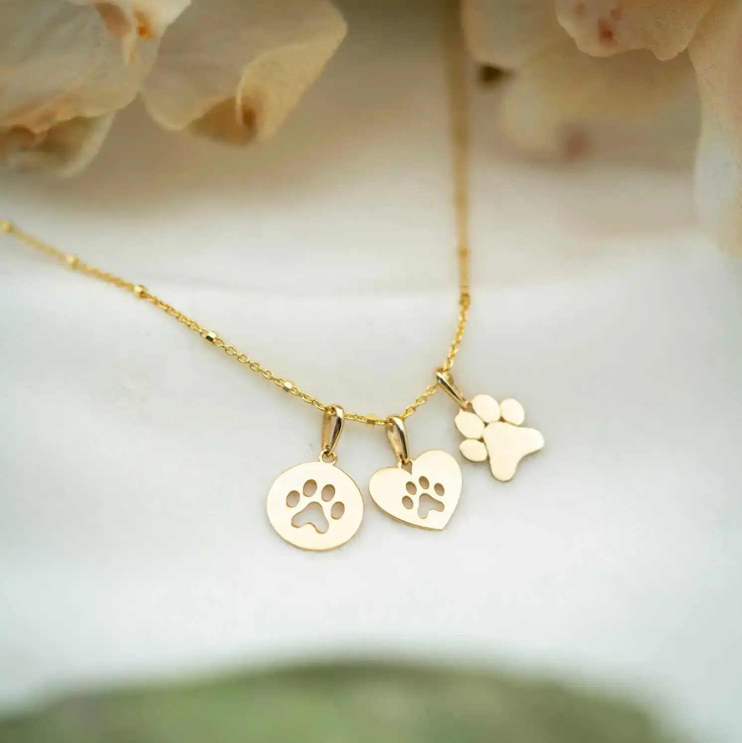 Anheng i gull Poten.