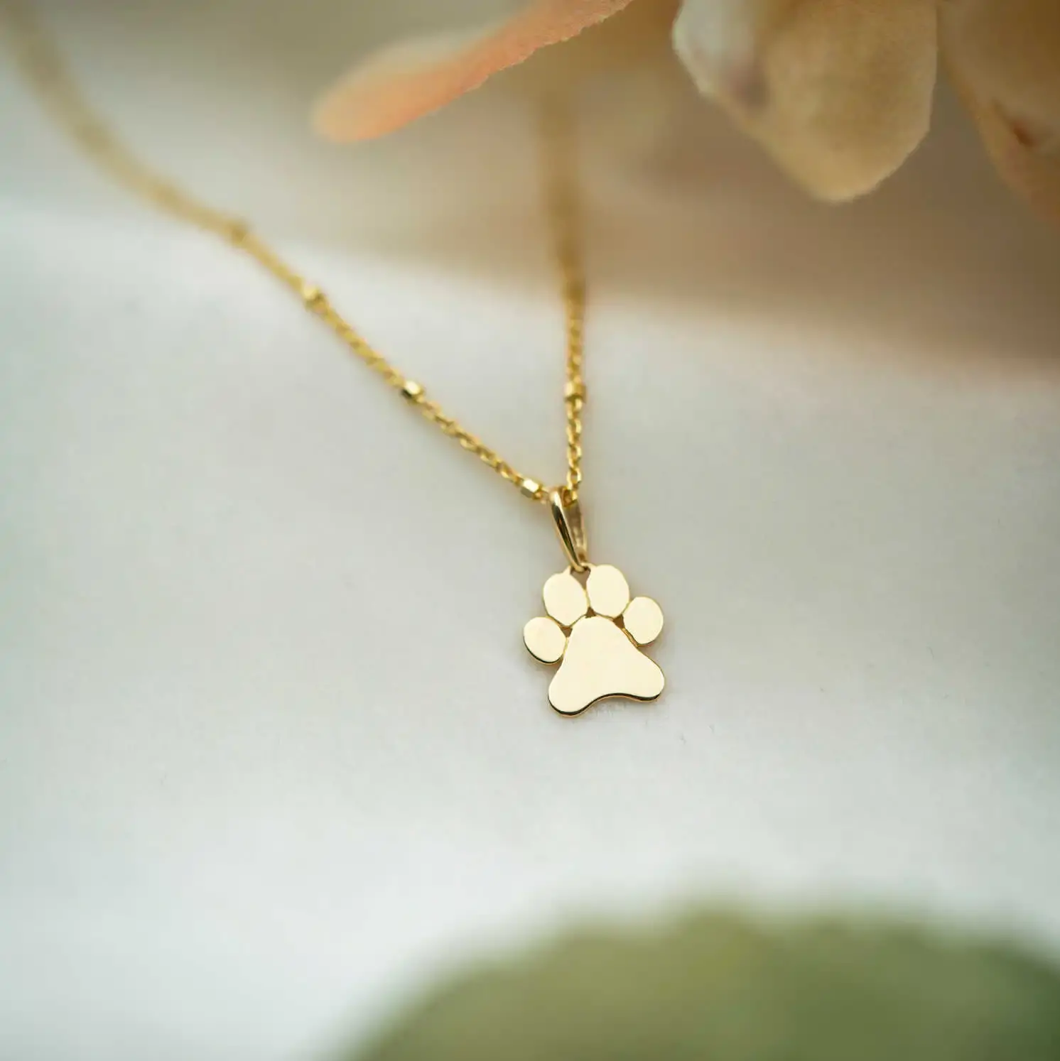 Anheng i gull Poten.